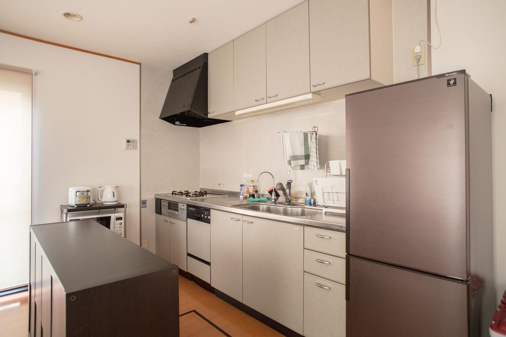 Guesthouse Iloha Киото Екстериор снимка
